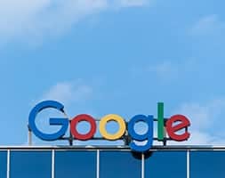 Old Google Logo Signage At Top of The Building