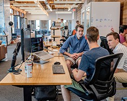 Group of Men In An Office Meeting