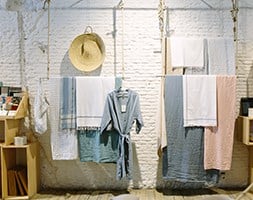 Boutique Displaying Lady's Dress and A Beach Hat