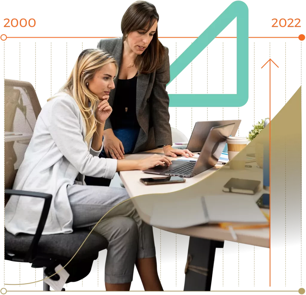 Two Women Looking at the Laptop
