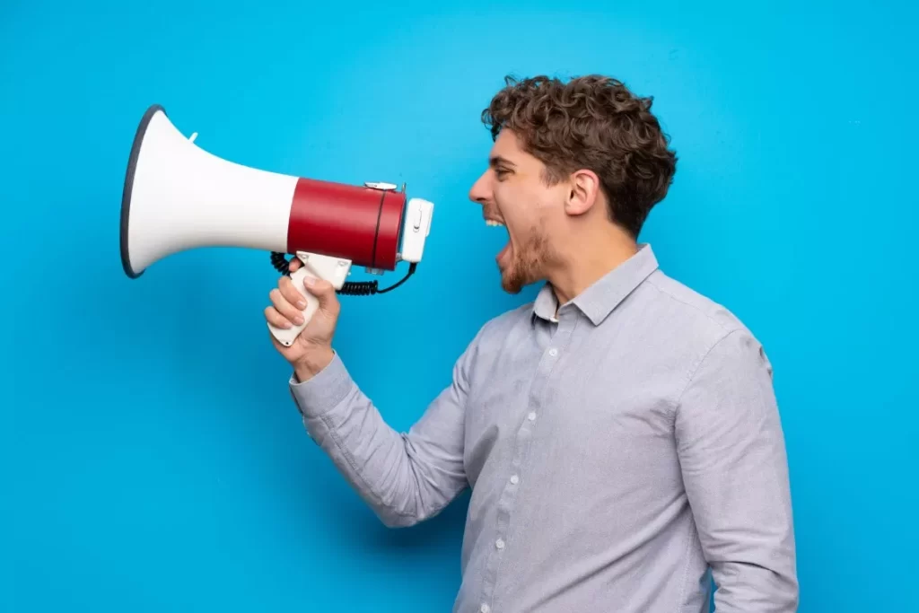 Man in Skyblue Background with Megaphone