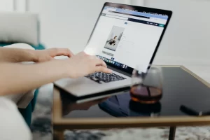 Person Typing on A Laptop