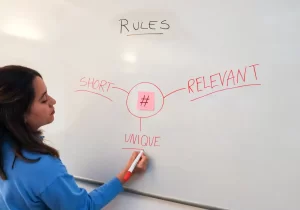 Woman Writing On The White Board